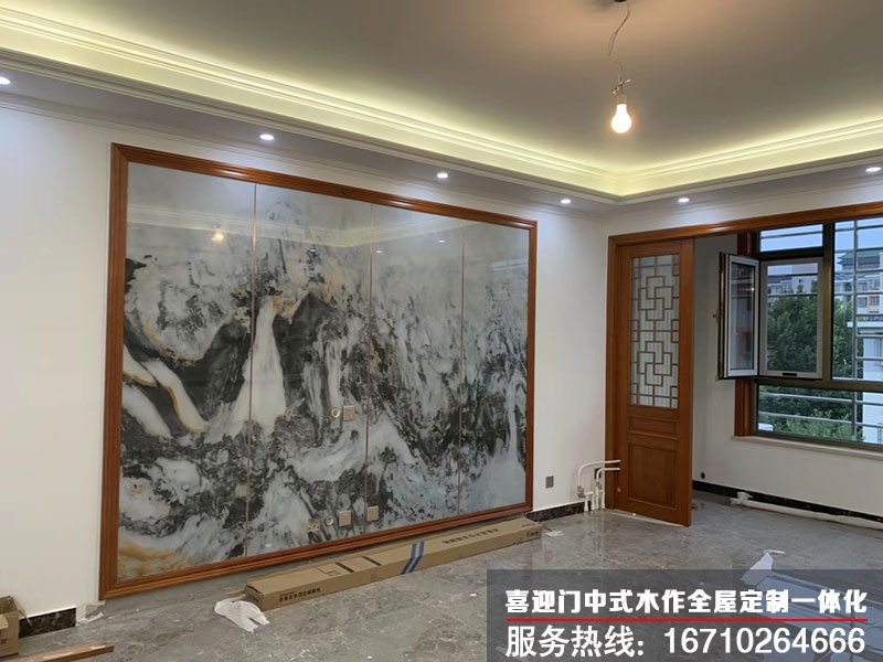 中式家居中客廳電視背景墻石材水墨畫安裝情況